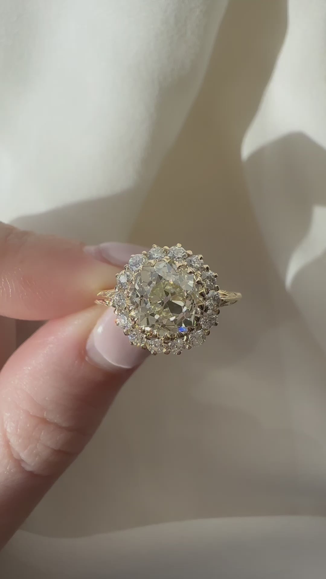 j-k-l color, si-i clarity diamond in yellow gold setting