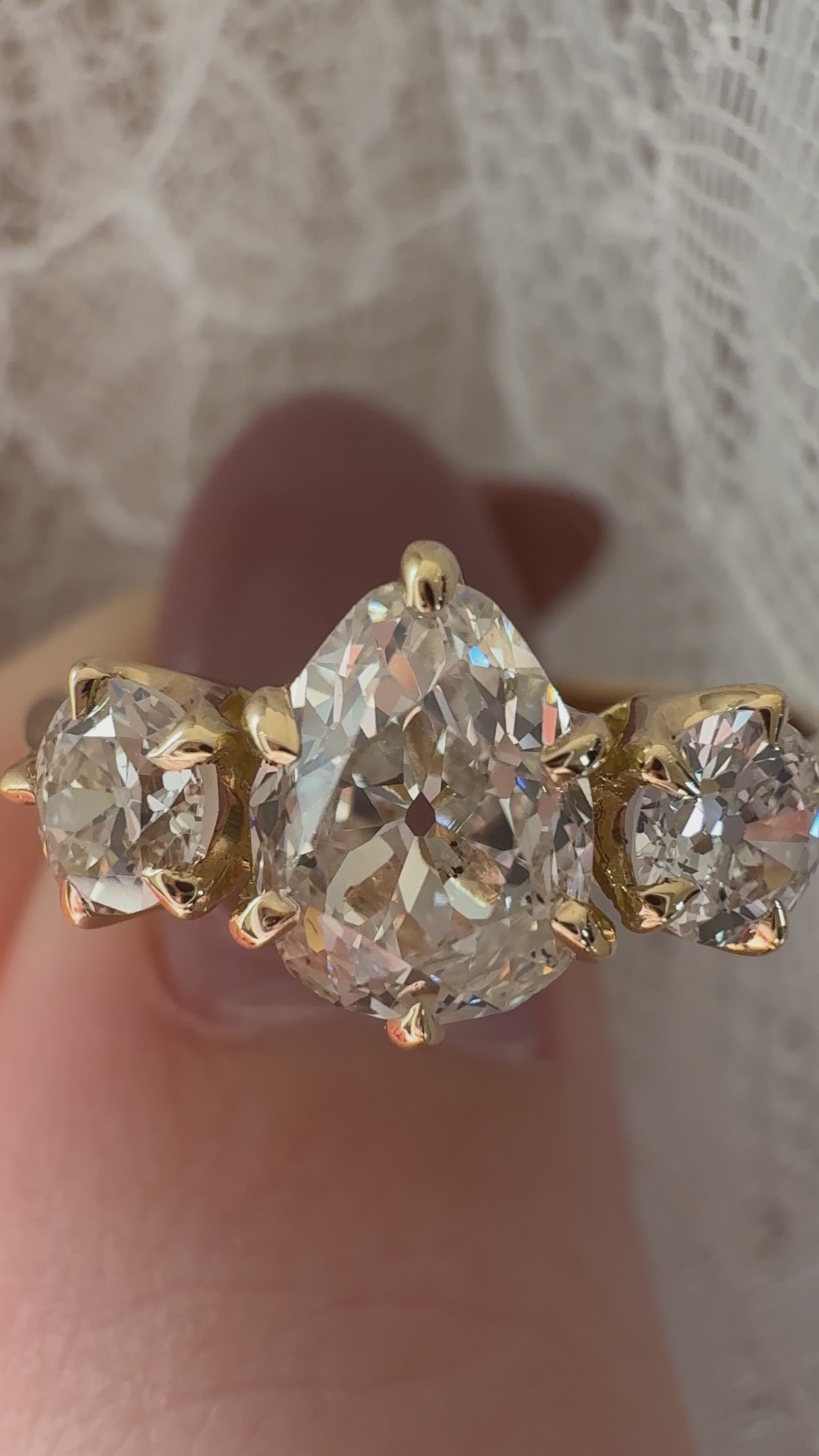 g-h-i color, si-i clarity diamond in yellow gold setting