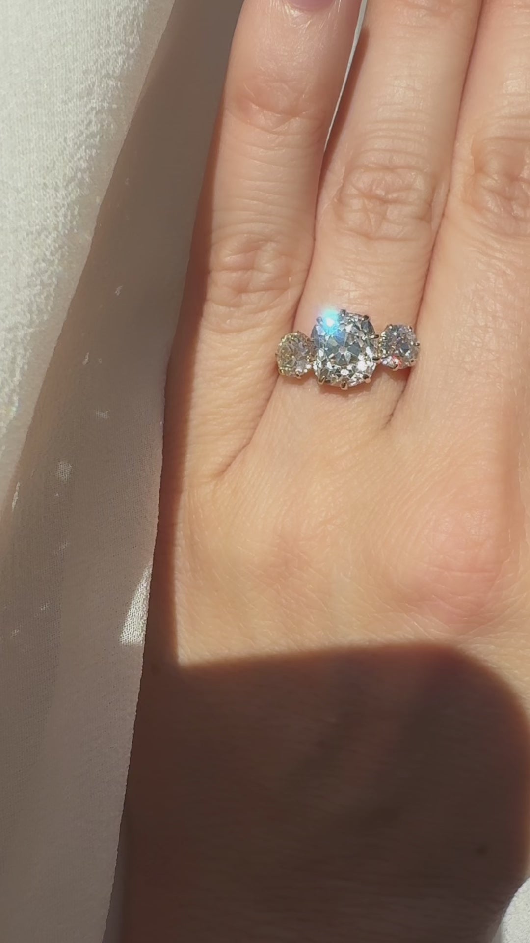 Three-stone Old Mine cut diamond Rings