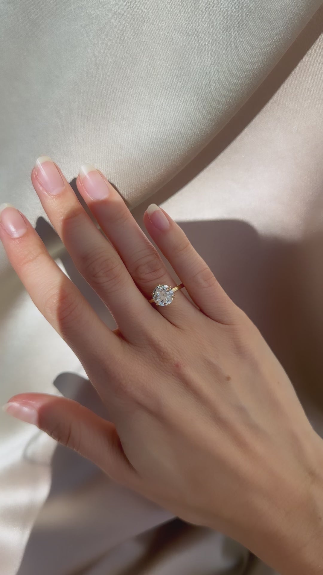 j-k-l color, si-i clarity diamond in yellow gold setting