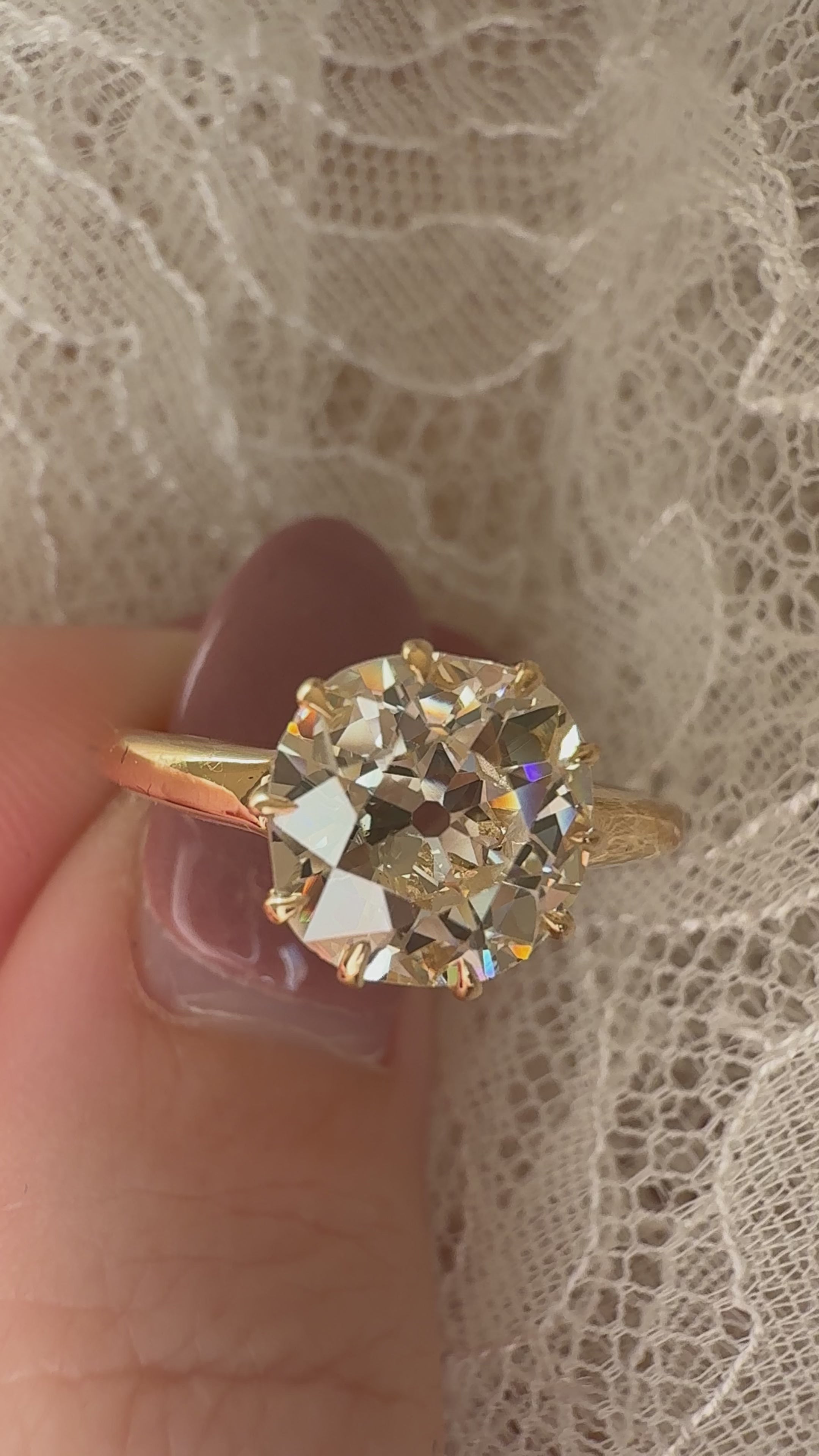 m-z color, vs clarity diamond in yellow gold setting