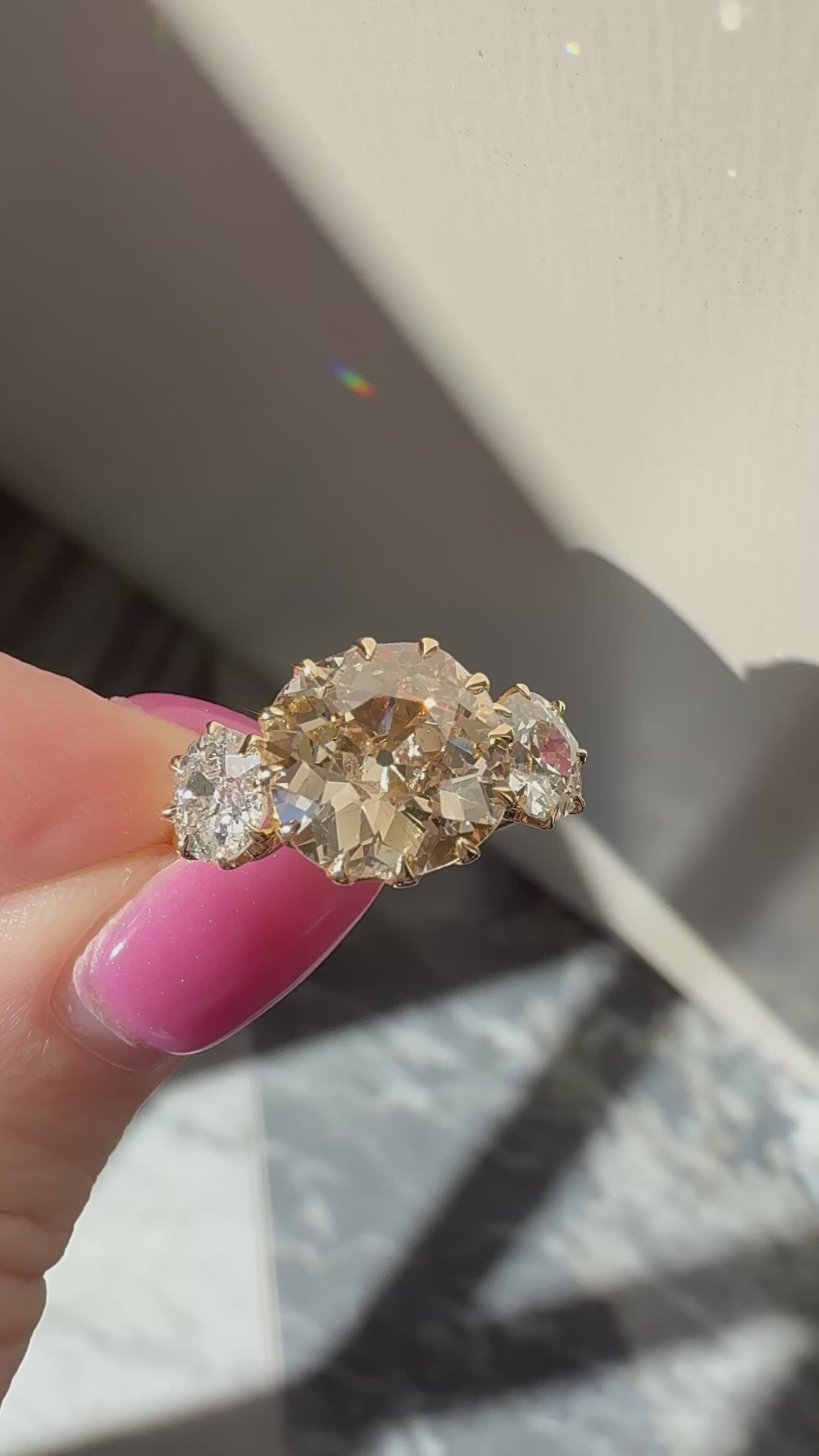 Three-stone Old Mine cut diamond Rings