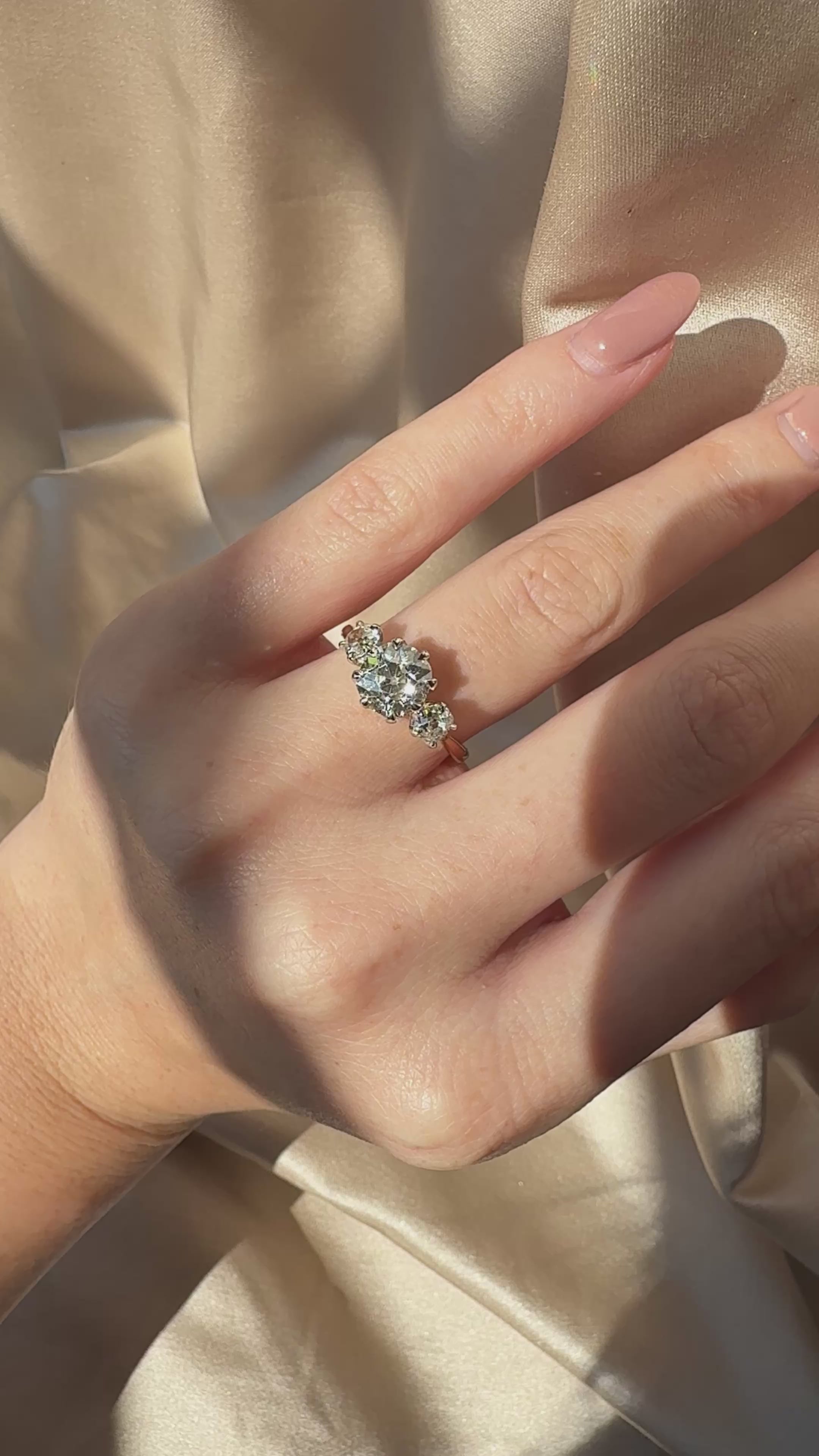 Three-stone Old Mine cut diamond Rings