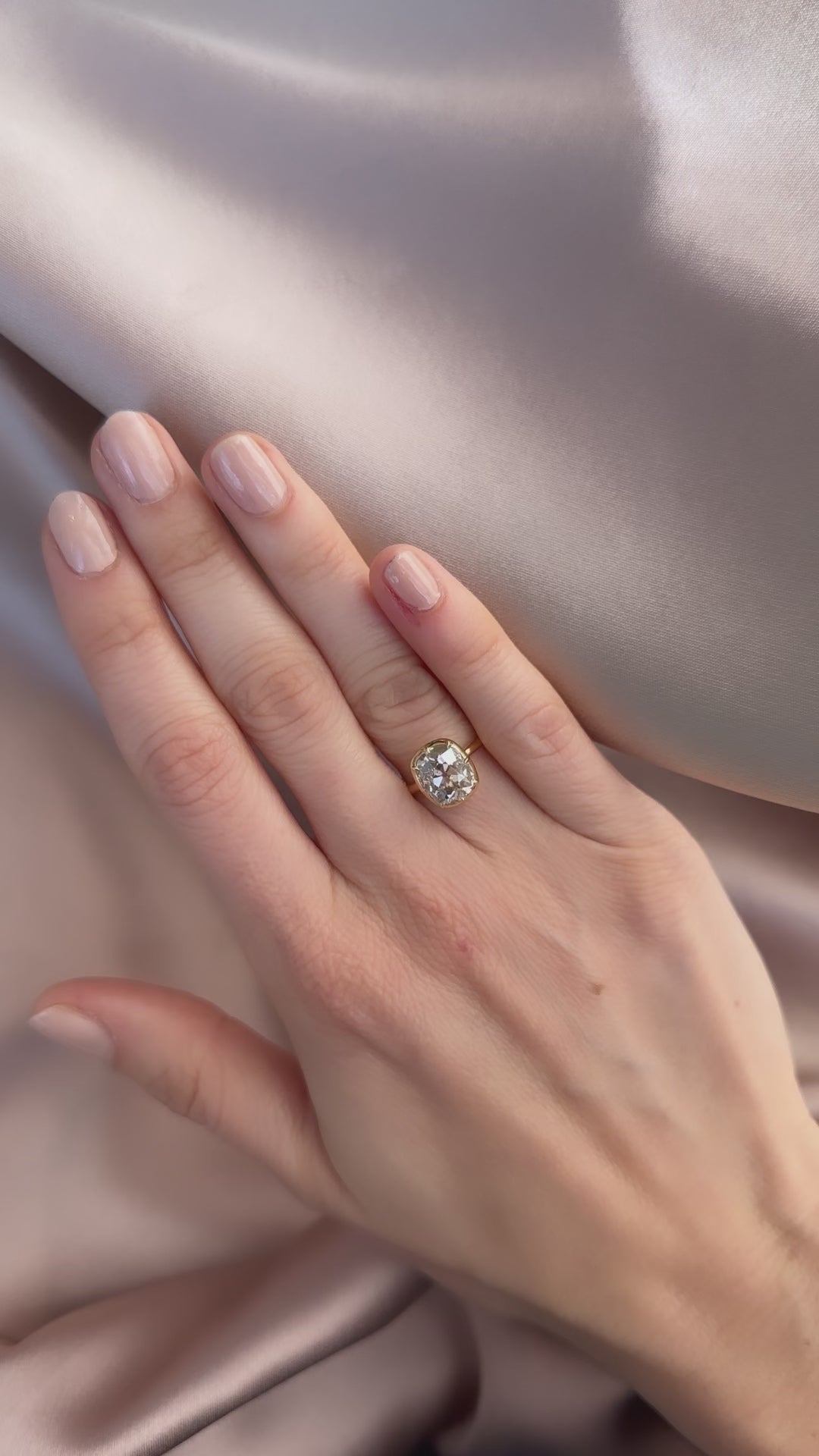 m-z color, si-i clarity diamond in yellow gold setting