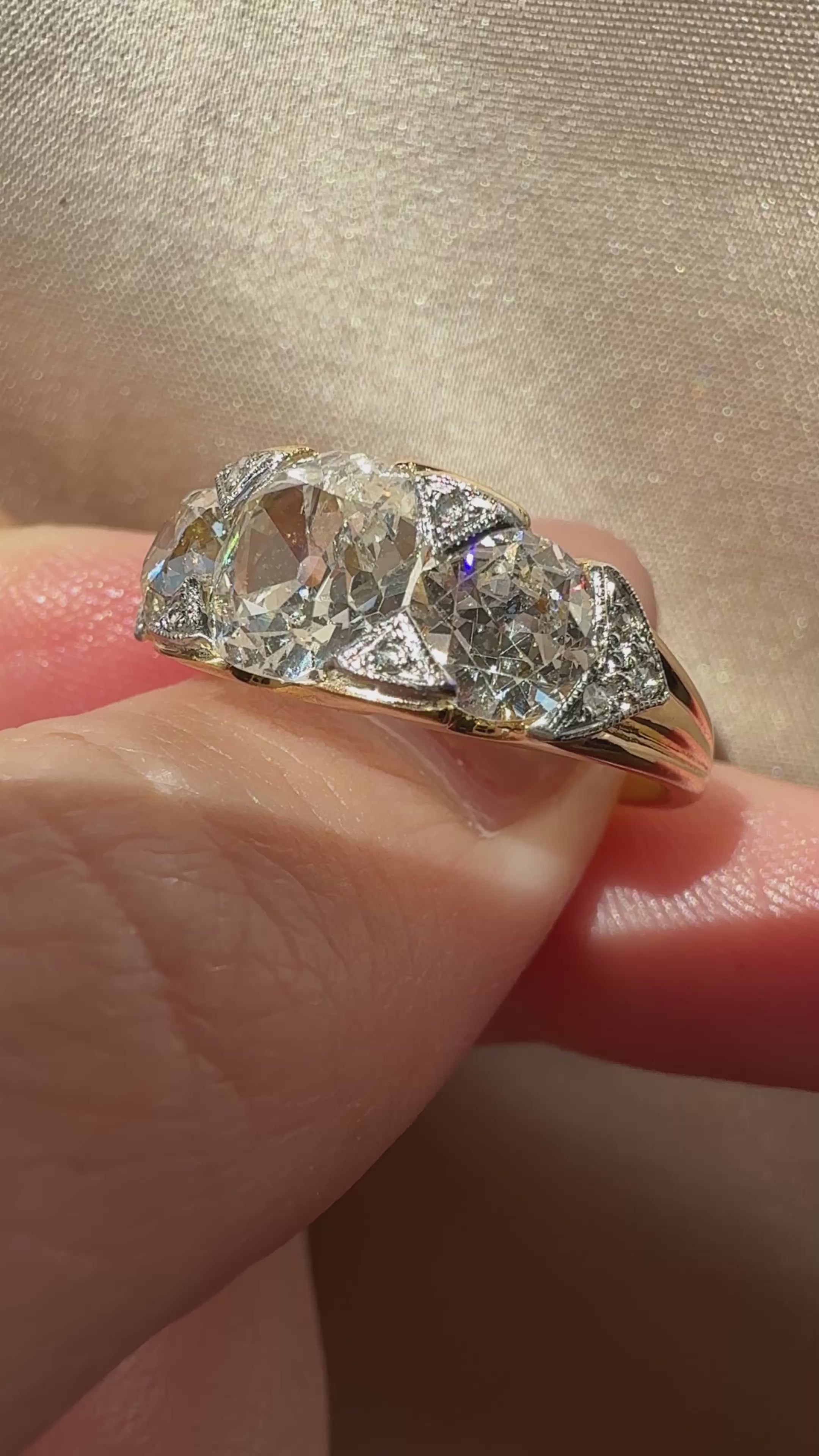 Three-stone Old Mine cut diamond Rings