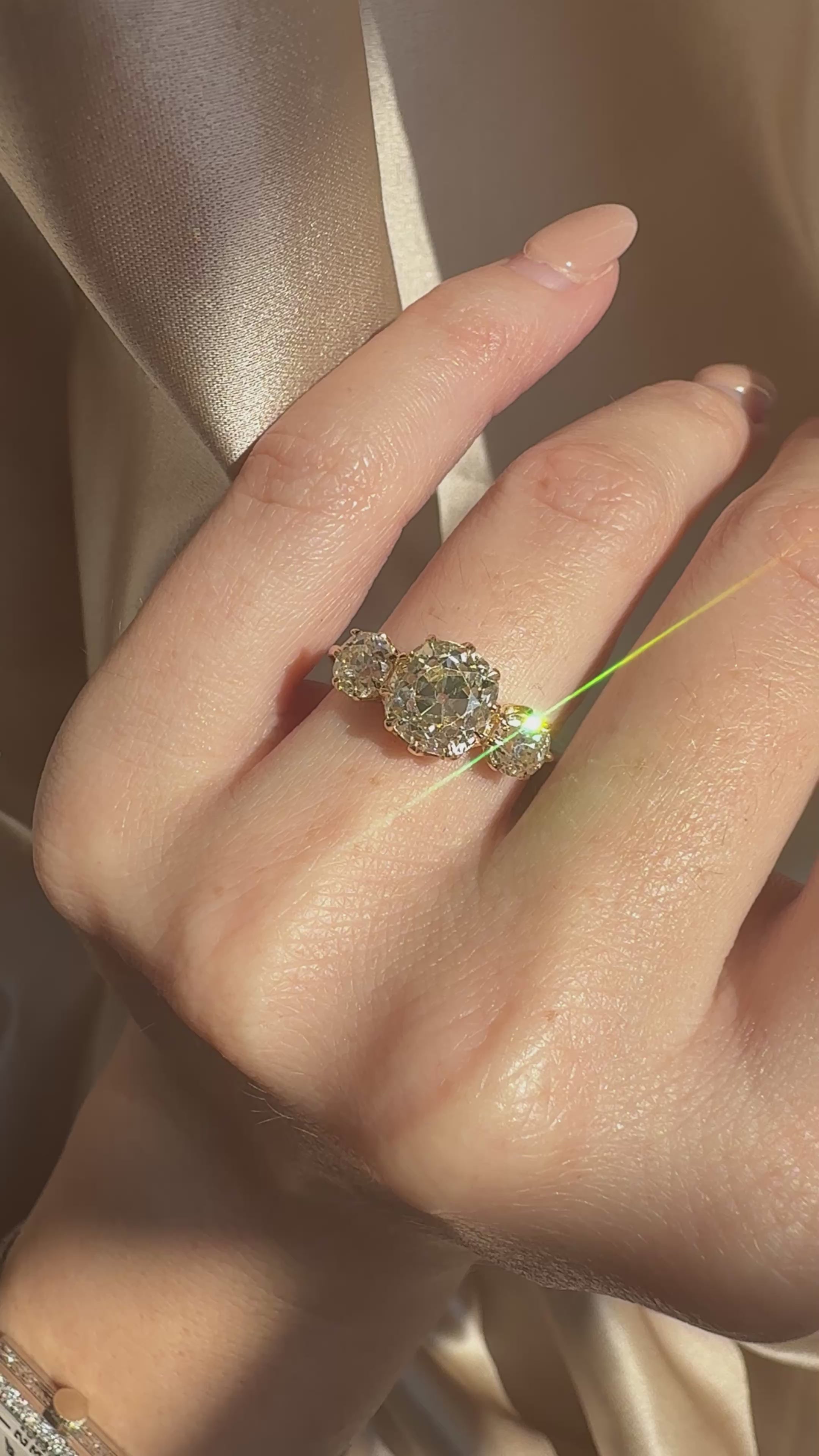 Three-stone Old Mine cut diamond Rings