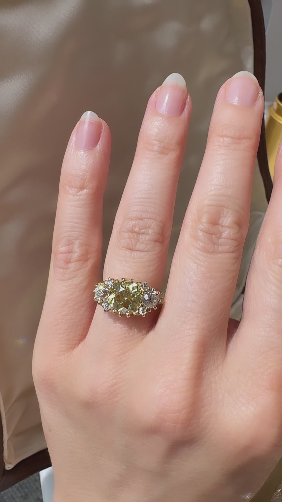 fancy color, si-i clarity diamond in yellow gold setting