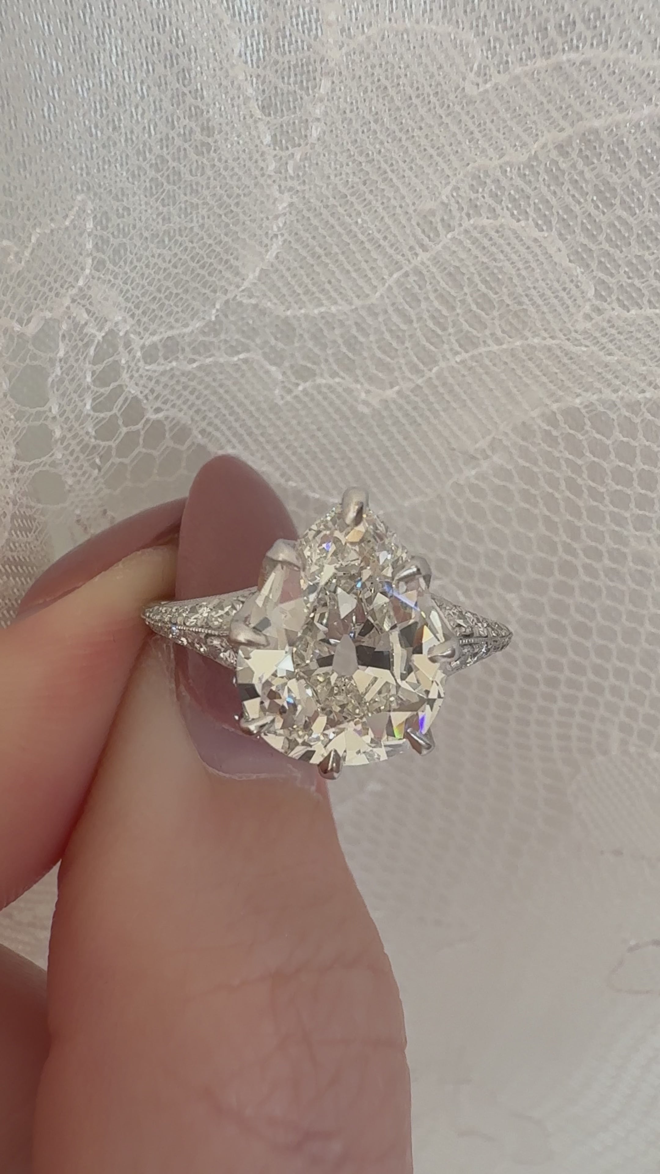 3.5 Carat Bright Antique Pear on Tapered Diamond-Studded Band