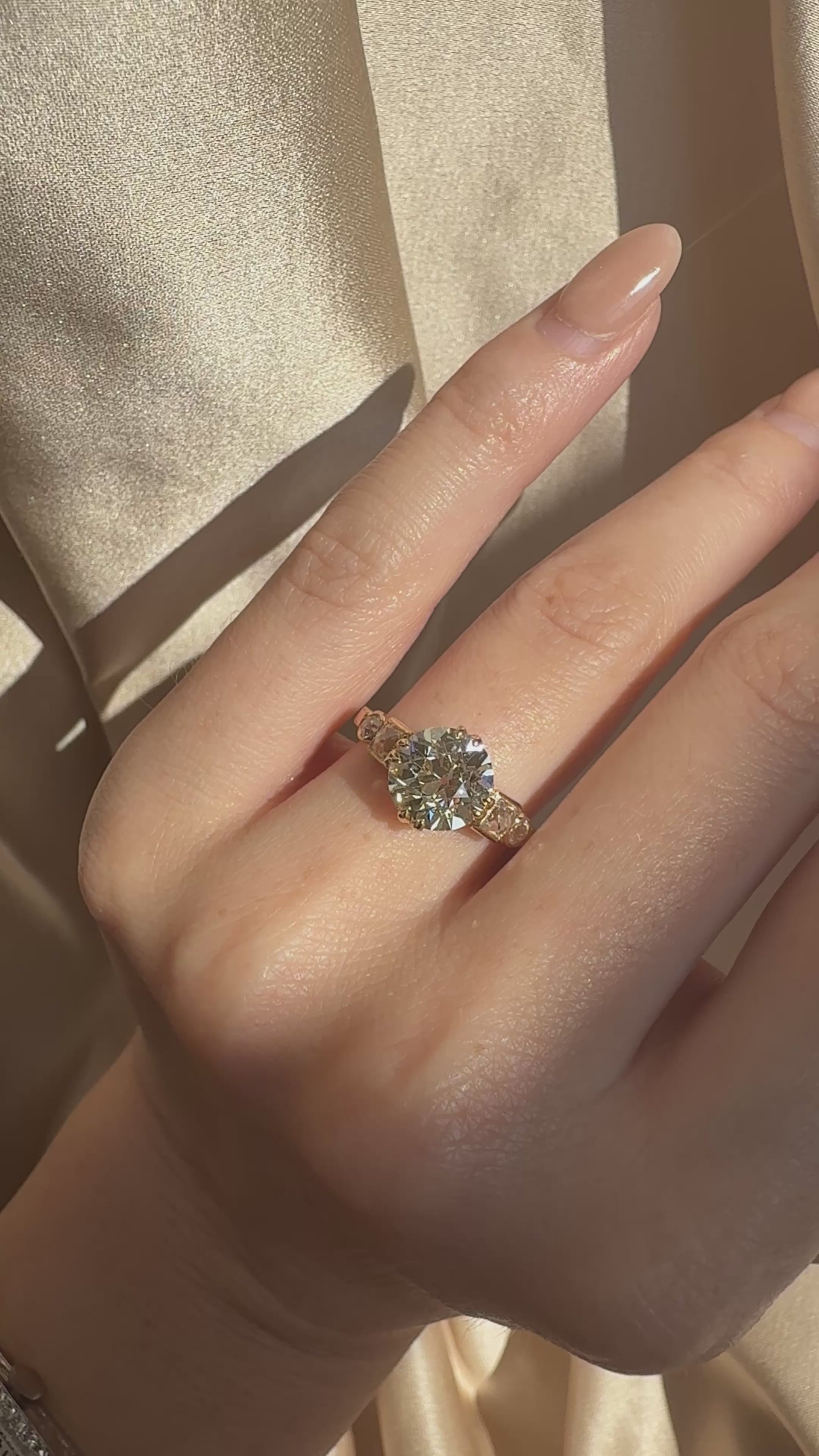 j-k-l color, si-i clarity diamond in yellow gold setting