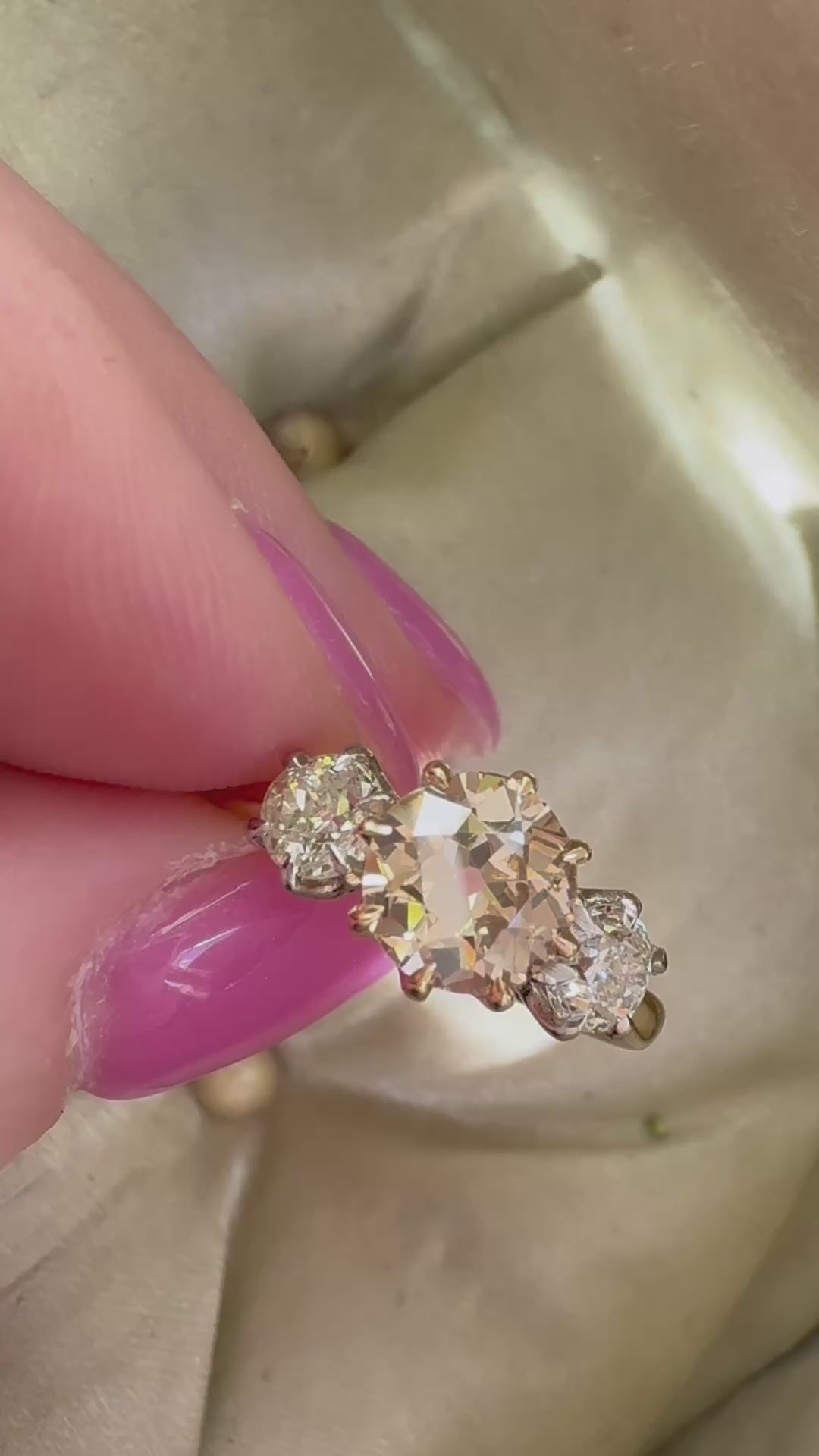 fancy color, si-i clarity diamond in two-tone setting