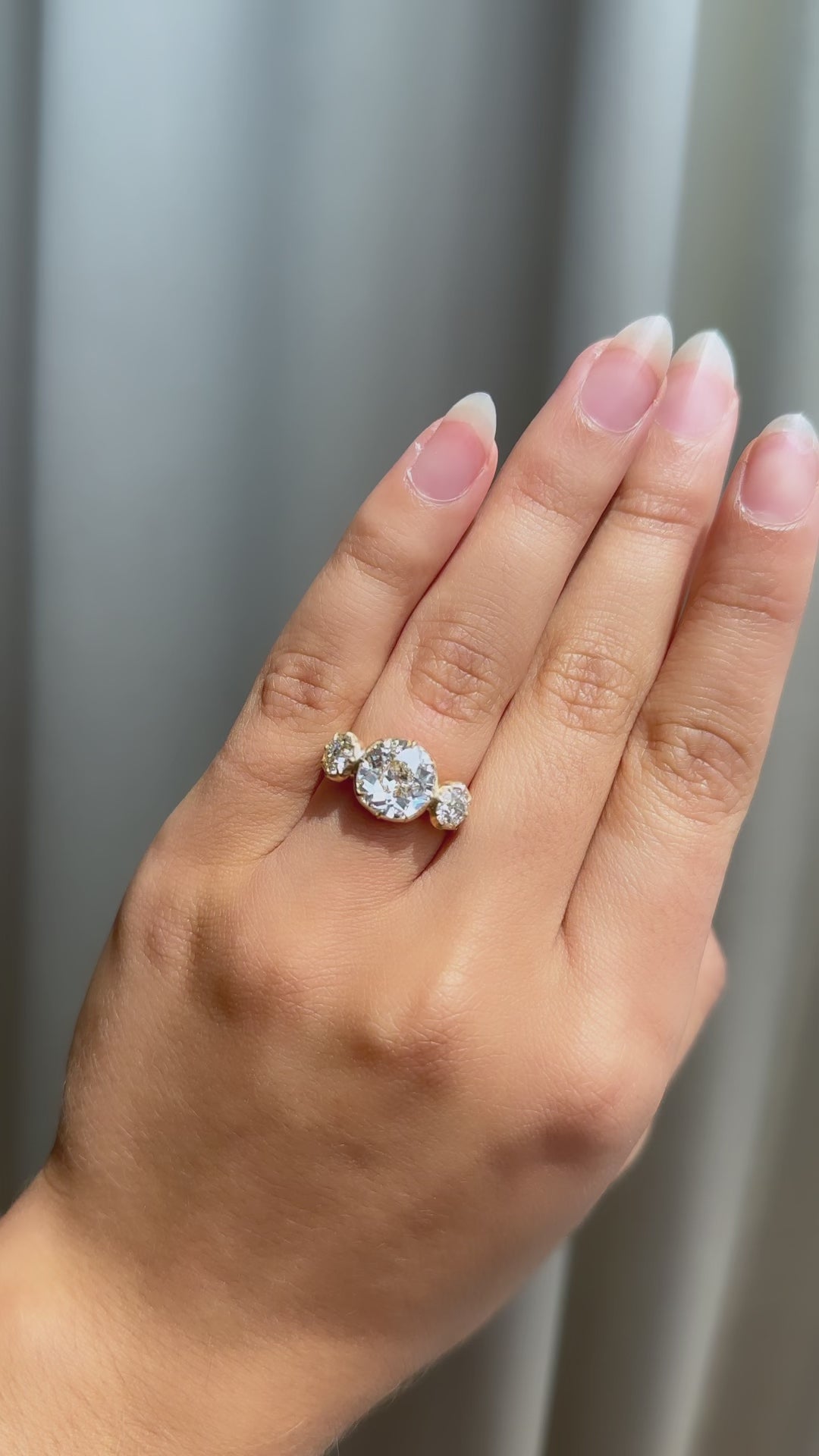 j-k-l color, si-i clarity diamond in yellow gold setting