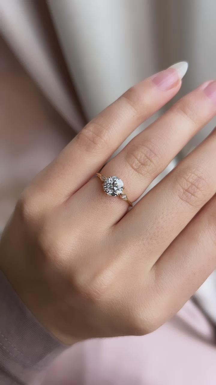 j-k-l color, si-i clarity diamond in yellow gold setting