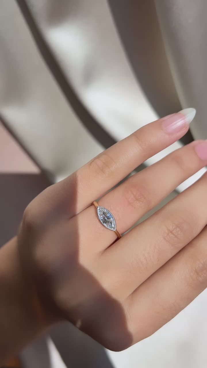 g-h-i color, si-i clarity diamond in two-tone setting