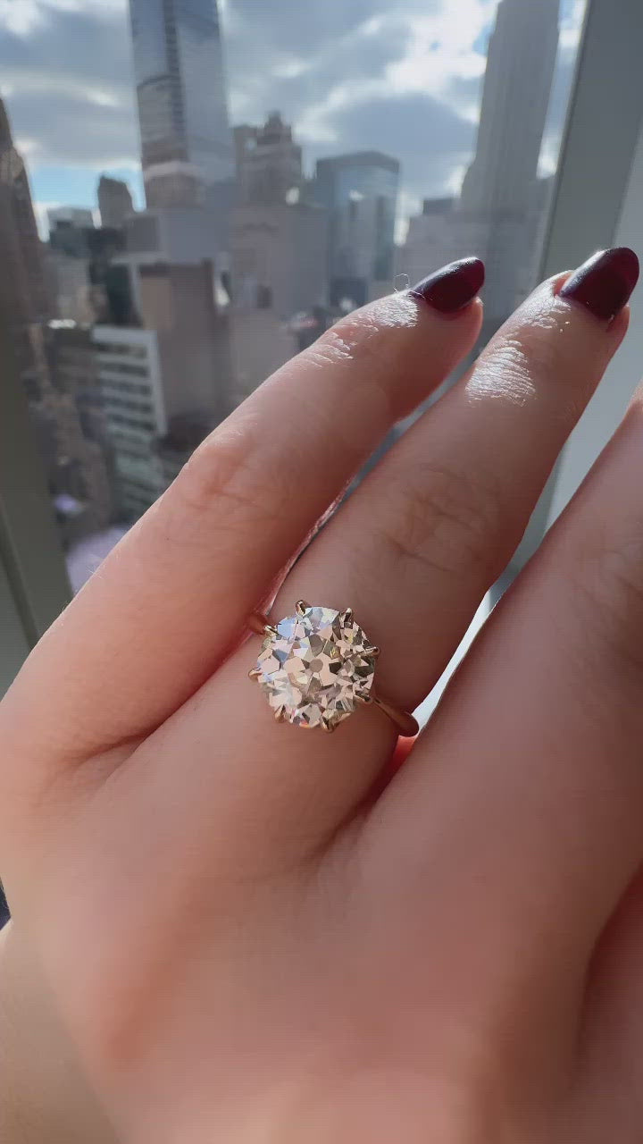 m-z color, vs clarity diamond in yellow gold setting