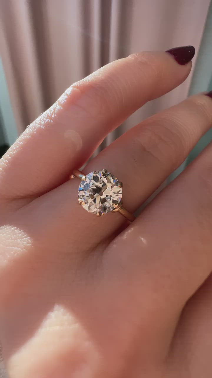 m-z color, si-i clarity diamond in yellow gold setting