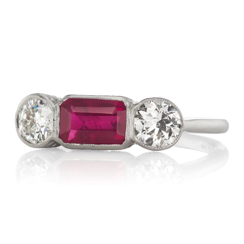 Bezel Set Ruby Engagement Ring with Diamond Side Stones