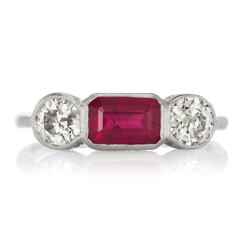 Bezel Set Ruby Engagement Ring with Diamond Side Stones