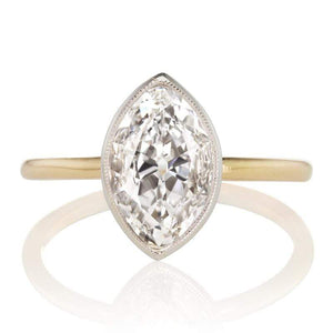 1.5 Carat Bezel Set Moval Cut Diamond Engagement Ring