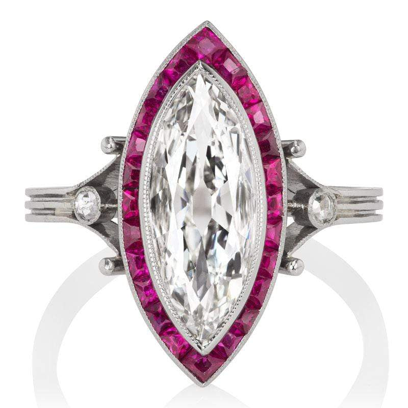 Marquise Cut Diamond Ring with 24 Calibré Cut Rubies
