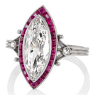 Marquise Cut Diamond Ring with 24 Calibré Cut Rubies