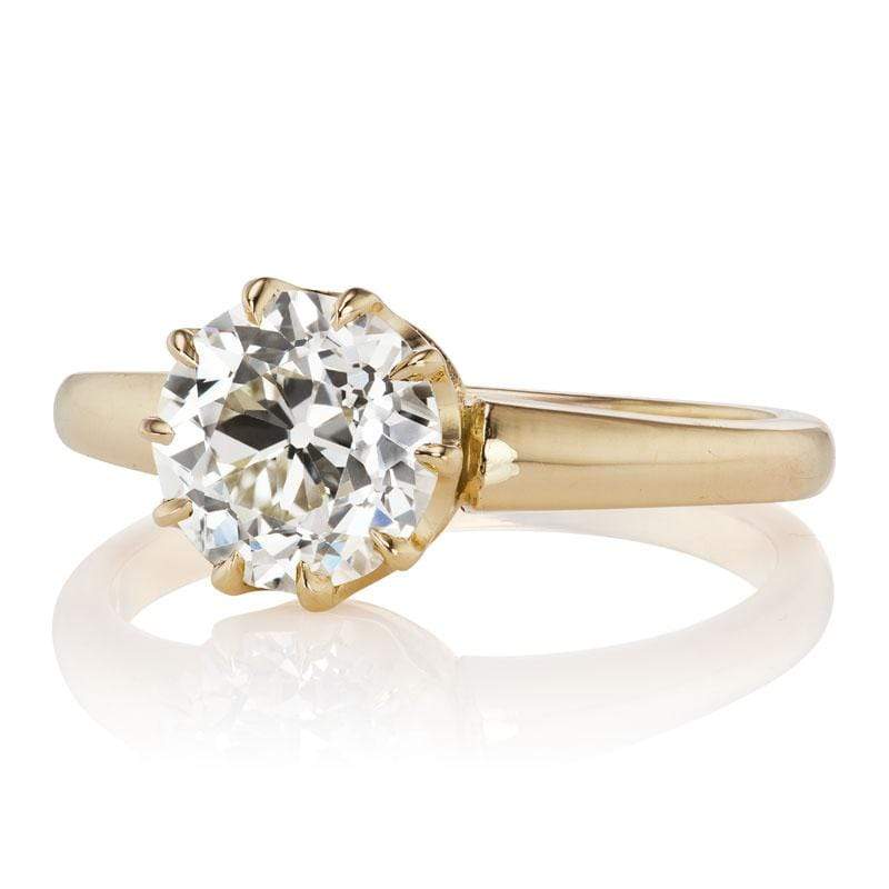 Solitaire Ring in a 10-prong 18 karat Yellow Gold Setting