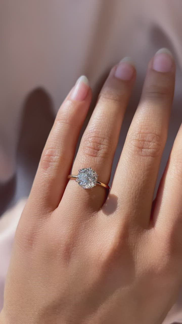 j-k-l color, si-i clarity diamond in two-tone setting