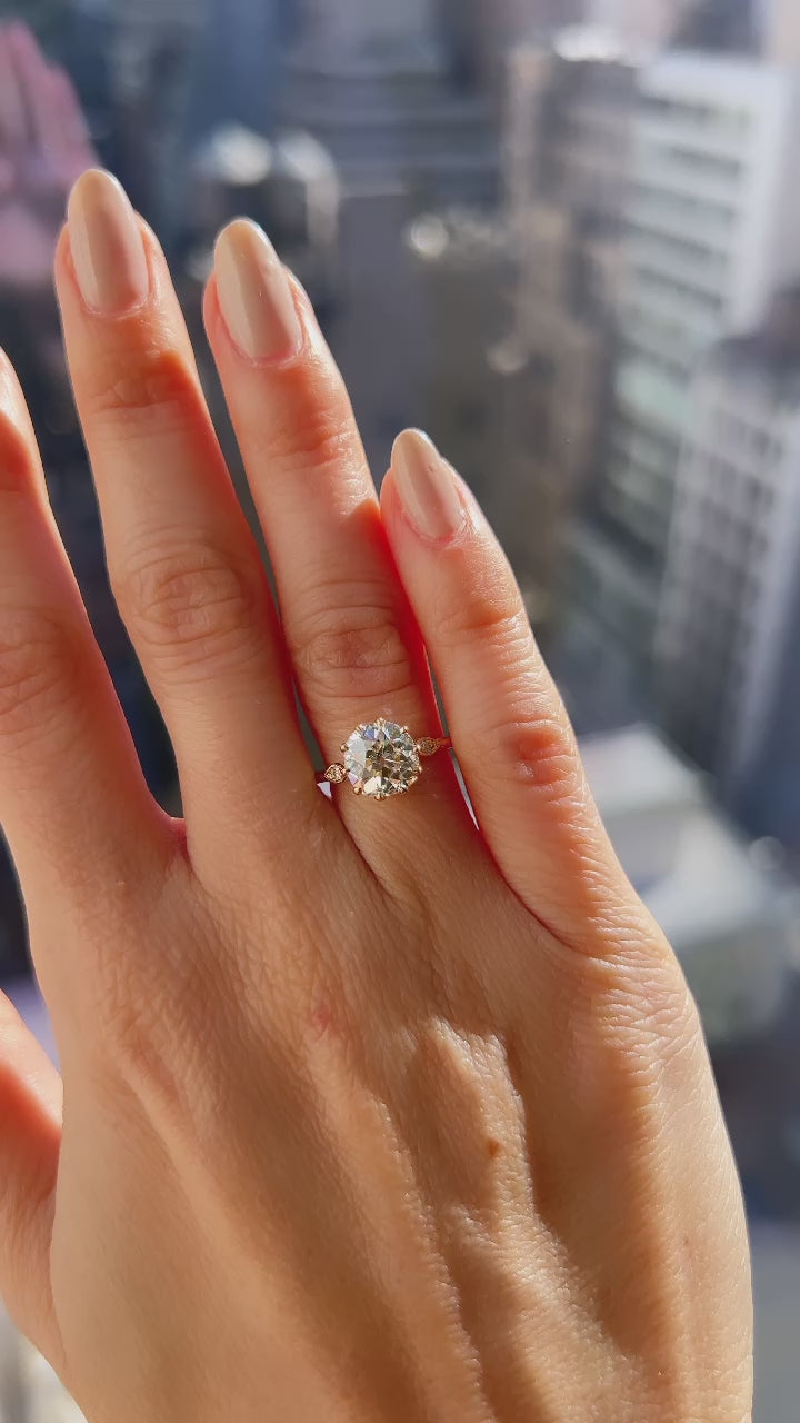 j-k-l color, si-i clarity diamond in yellow gold setting