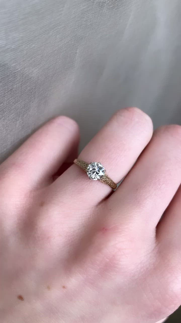 g-h-i color, vs clarity diamond in yellow gold setting