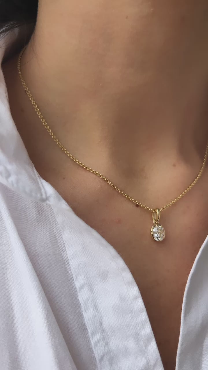 j-k-l color, si-i clarity diamond in yellow gold setting