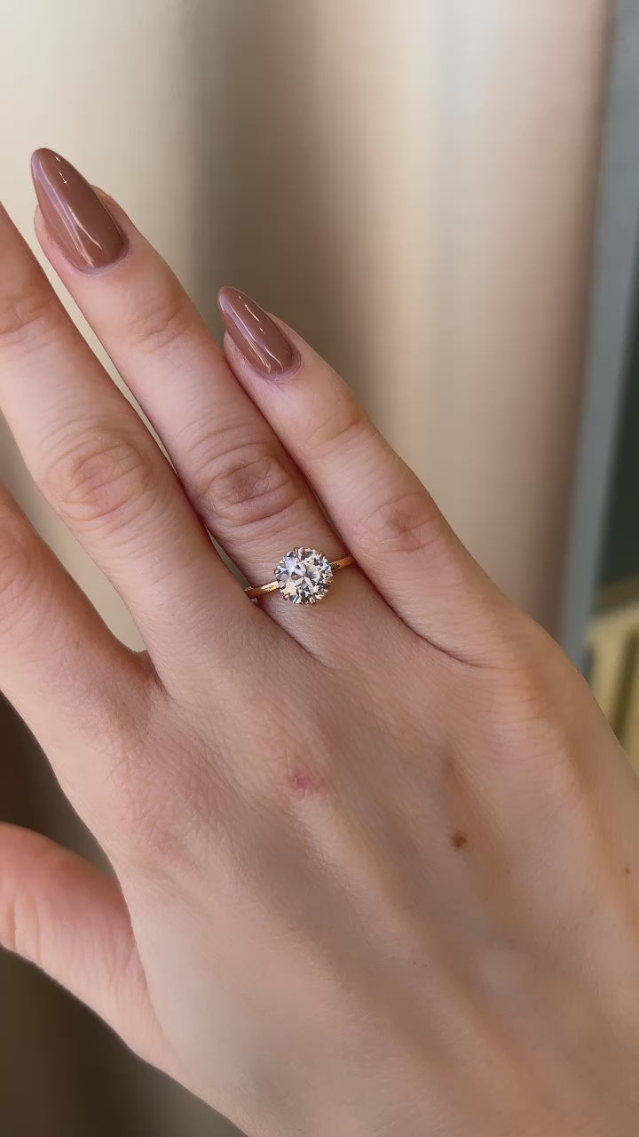 m-z color, si-i clarity diamond in yellow gold setting