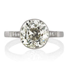 Bezel Set 3.83 ct Old European Cut Engagement Ring with Side Stones
