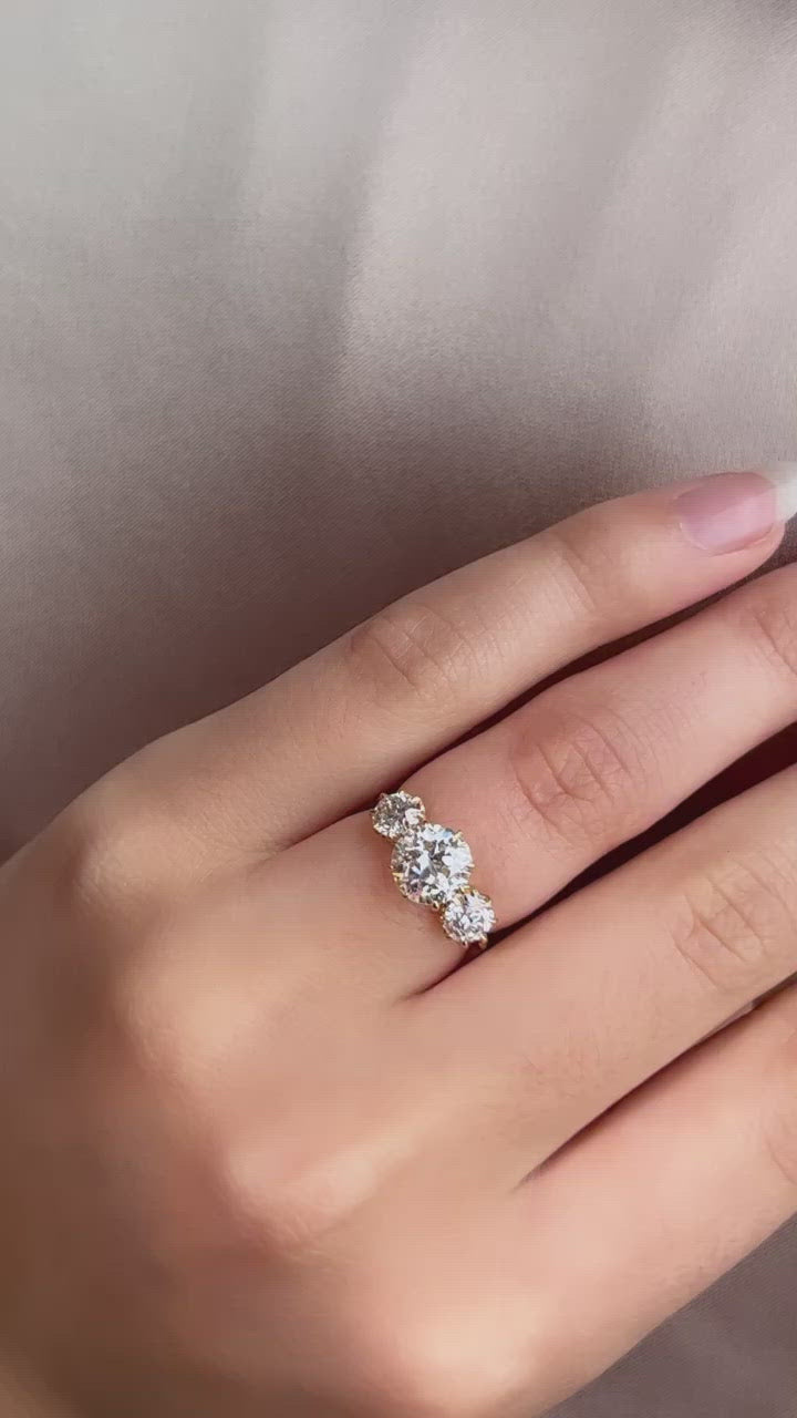 j-k-l color, si-i clarity diamond in yellow gold setting