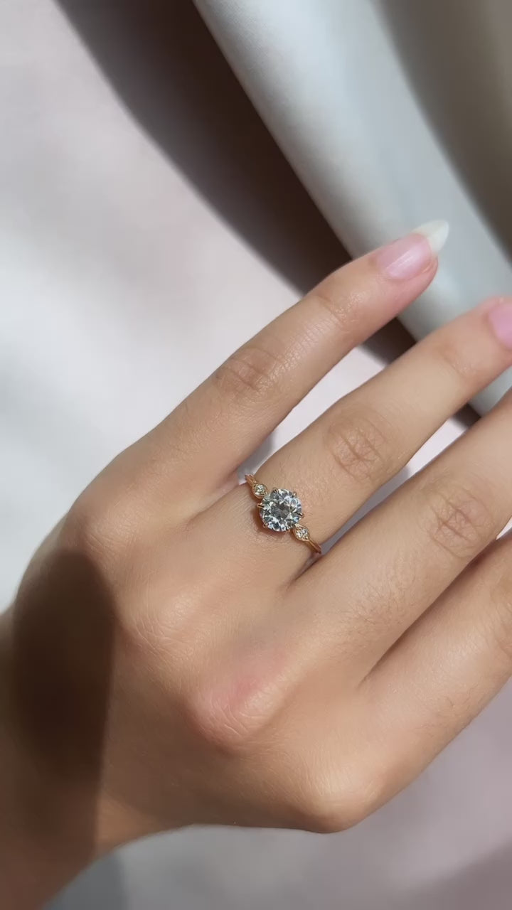 m-z color, vs clarity diamond in yellow gold setting