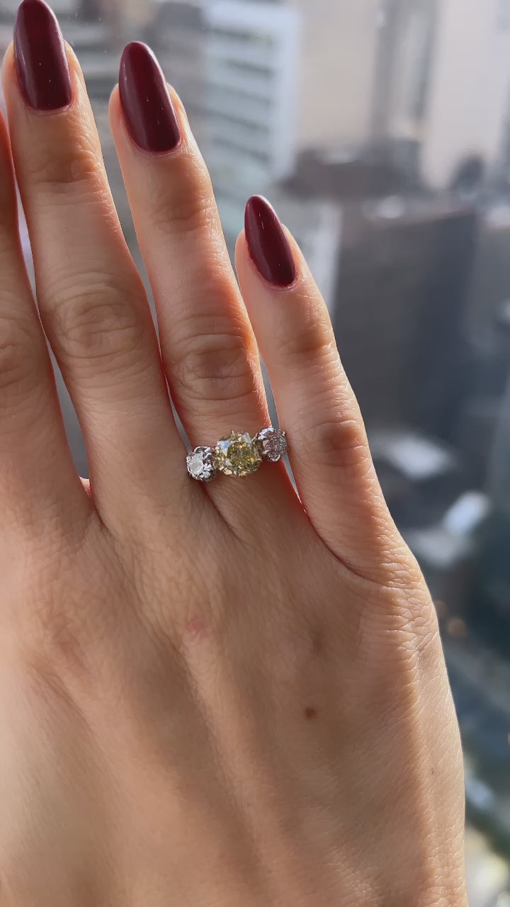 fancy color, vs clarity diamond in two-tone setting