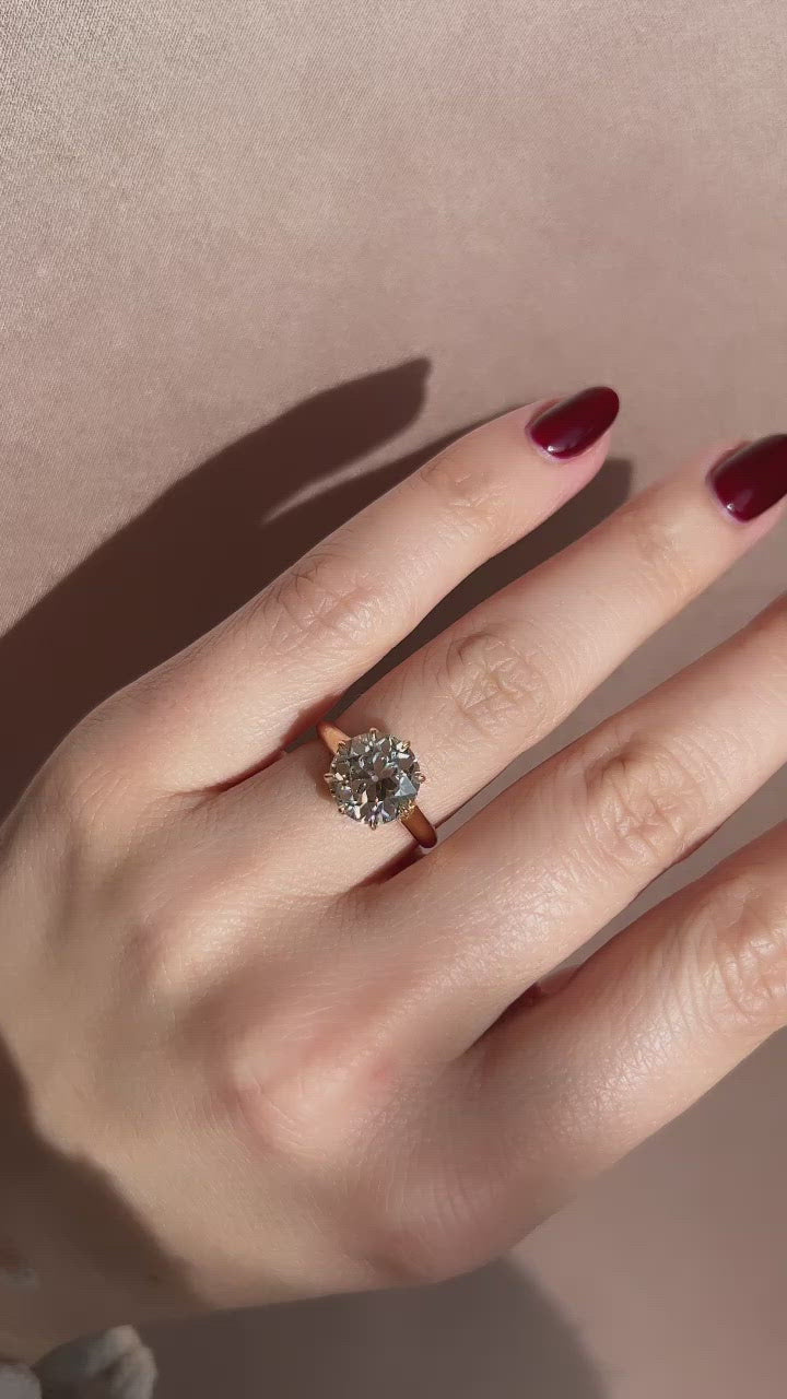 m-z color, vs clarity diamond in yellow gold setting