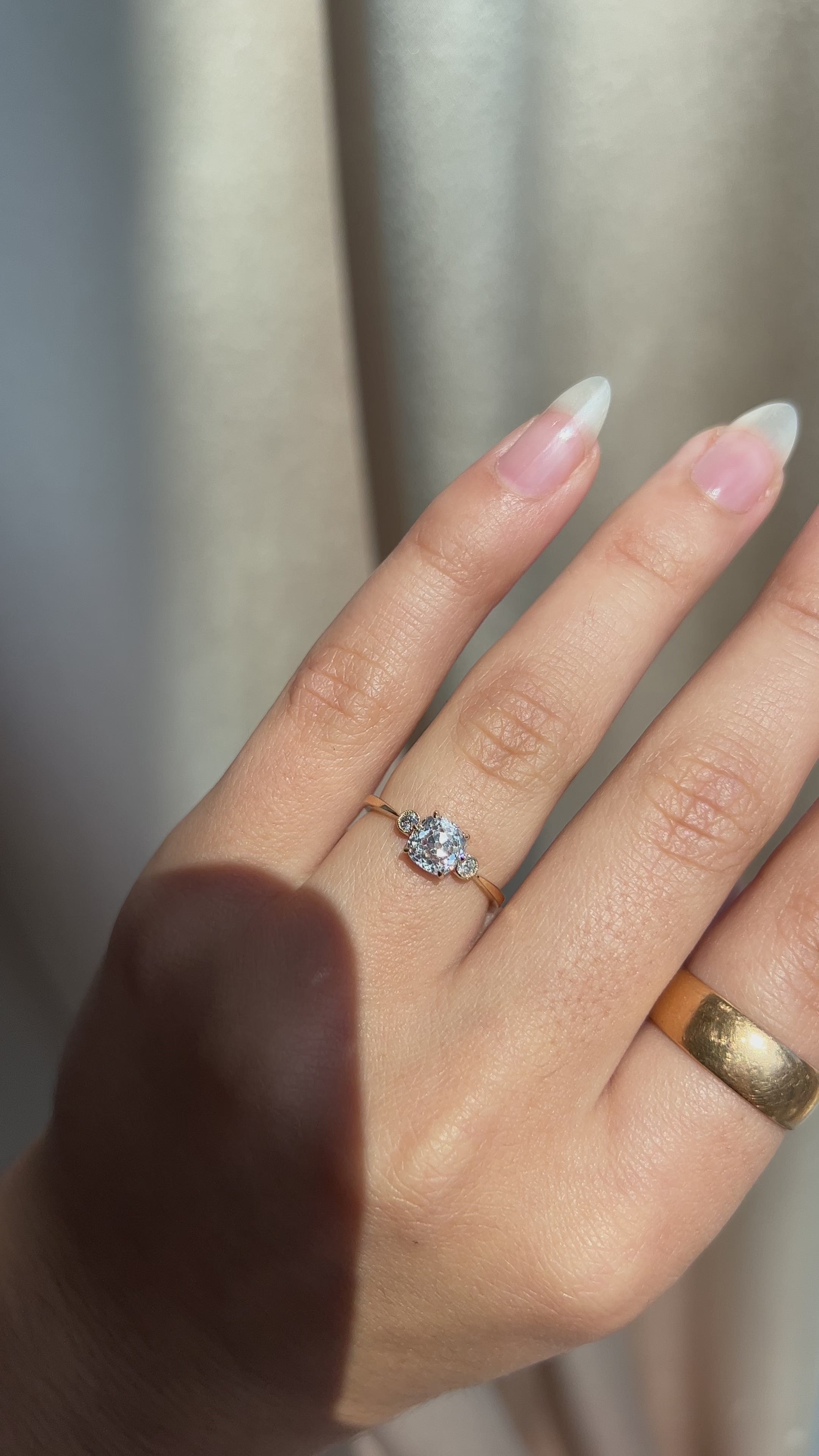 j-k-l color, si-i clarity diamond in yellow gold setting