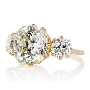 Light Yellow Diamond Three Stone Engagement Ring