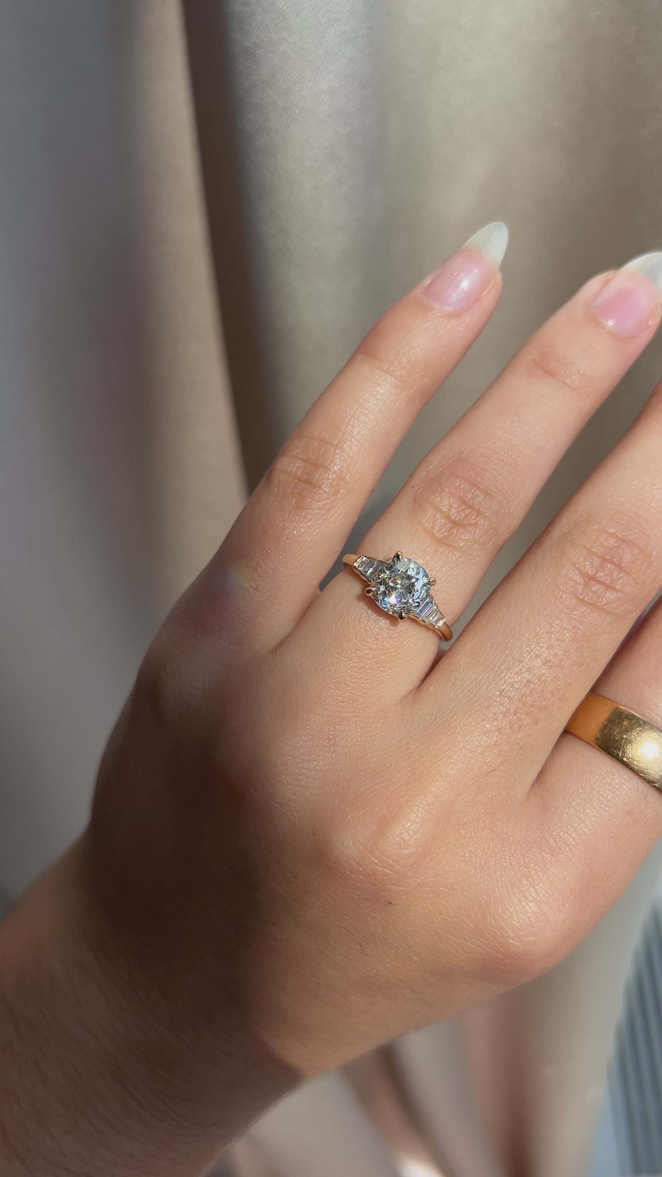 j-k-l color, si-i clarity diamond in yellow gold setting