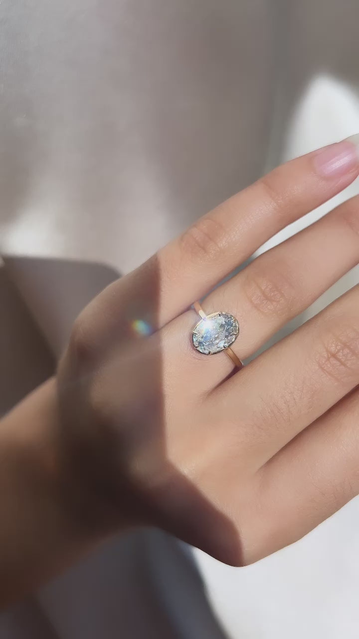 m-z color, si-i clarity diamond in yellow gold setting