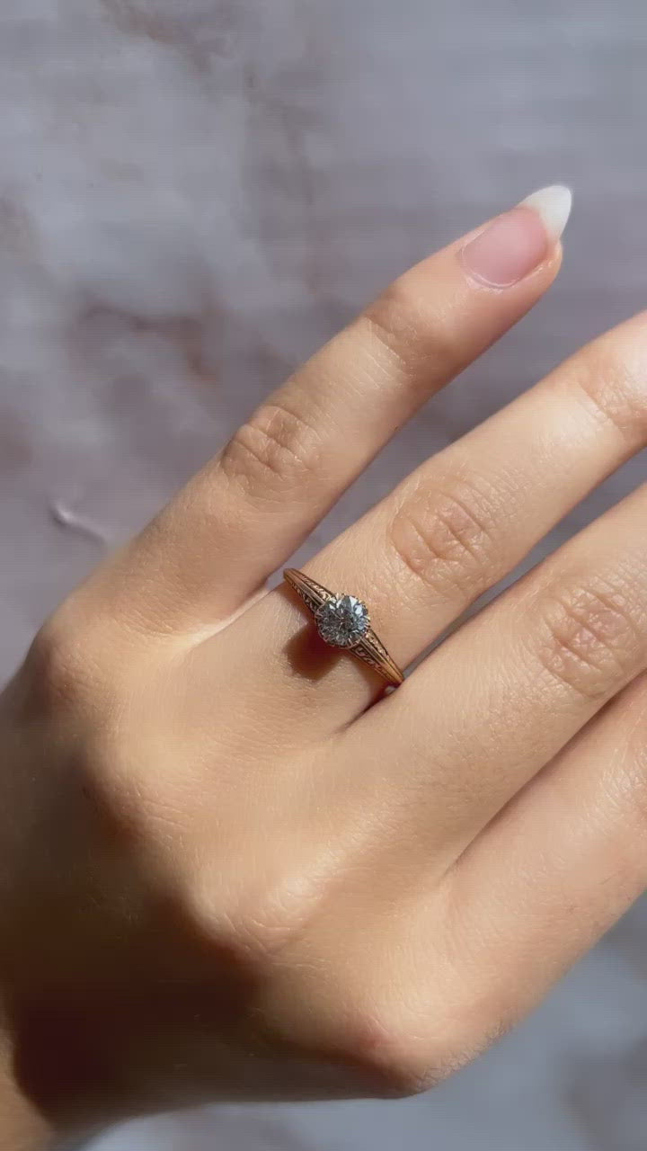 g-h-i color, vs clarity diamond in yellow gold setting