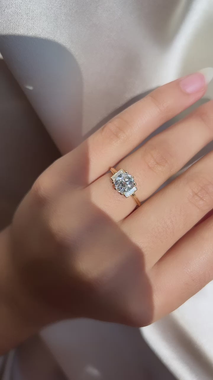 j-k-l color, si-i clarity diamond in yellow gold setting