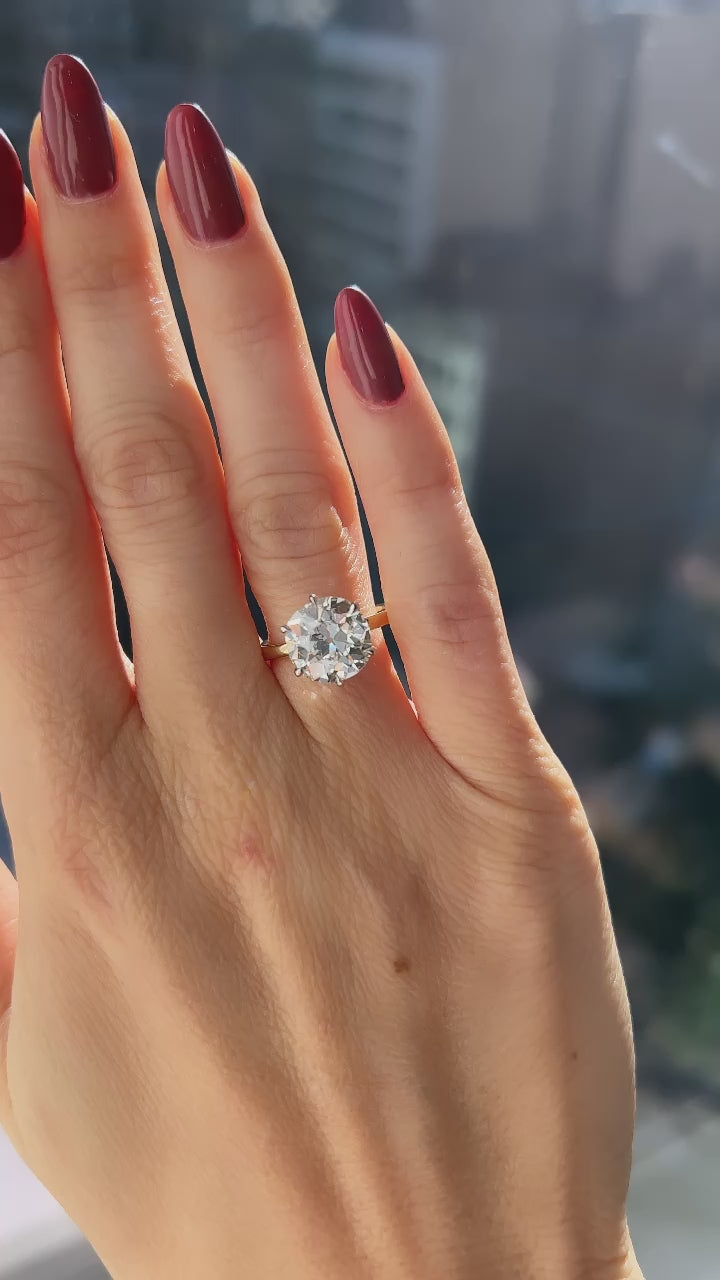 j-k-l color, vs clarity diamond in two-tone setting