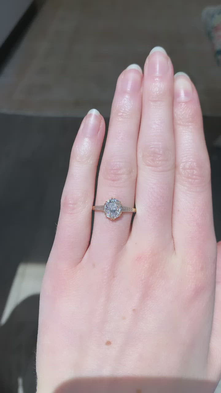 j-k-l color, si-i clarity diamond in two-tone setting