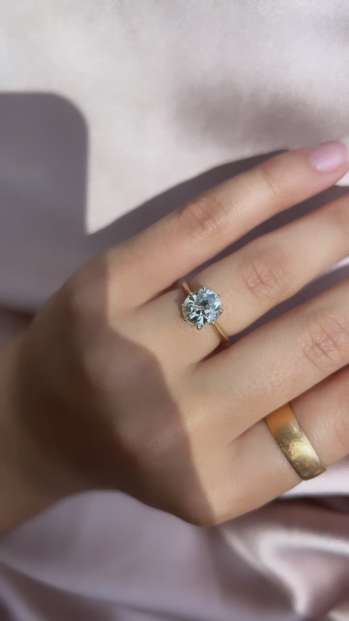 m-z color, si-i clarity diamond in yellow gold setting