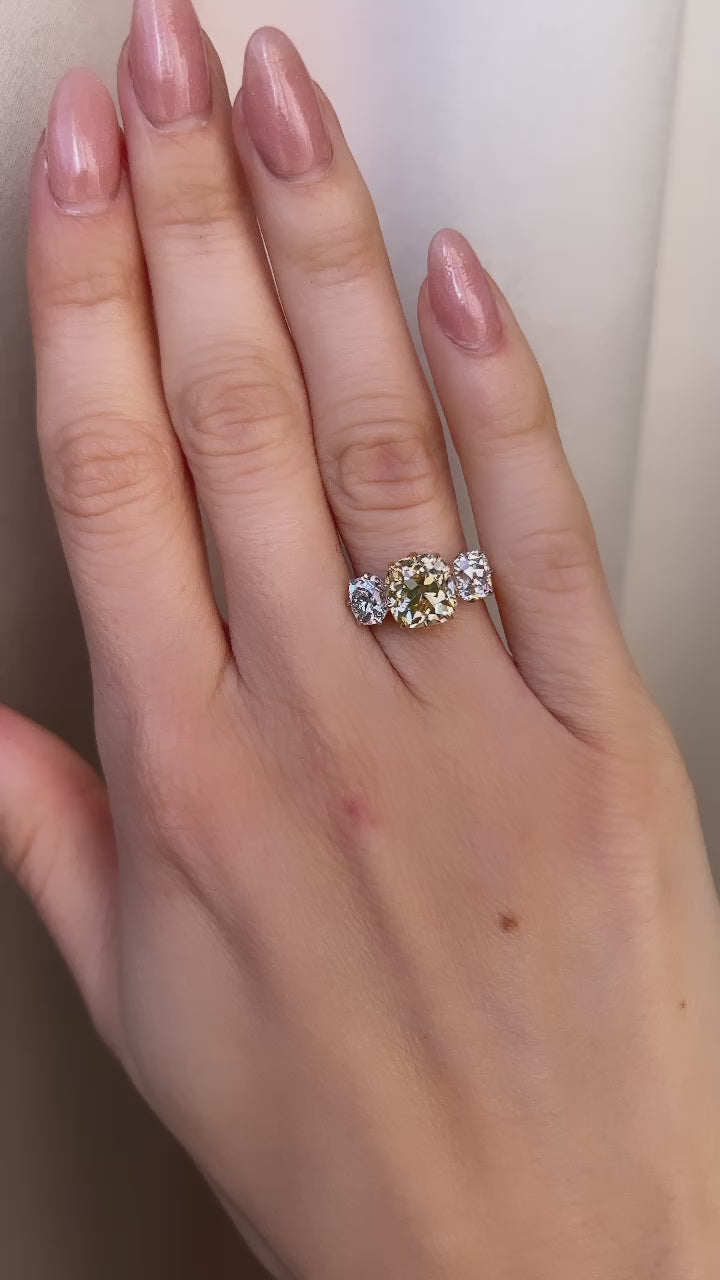 fancy color, si-i clarity diamond in two-tone setting