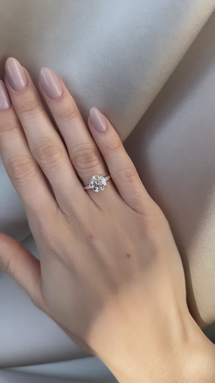 m-z color, vs clarity diamond in yellow gold setting