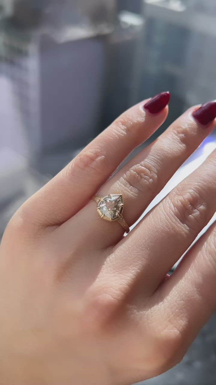 j-k-l color, si-i clarity diamond in yellow gold setting