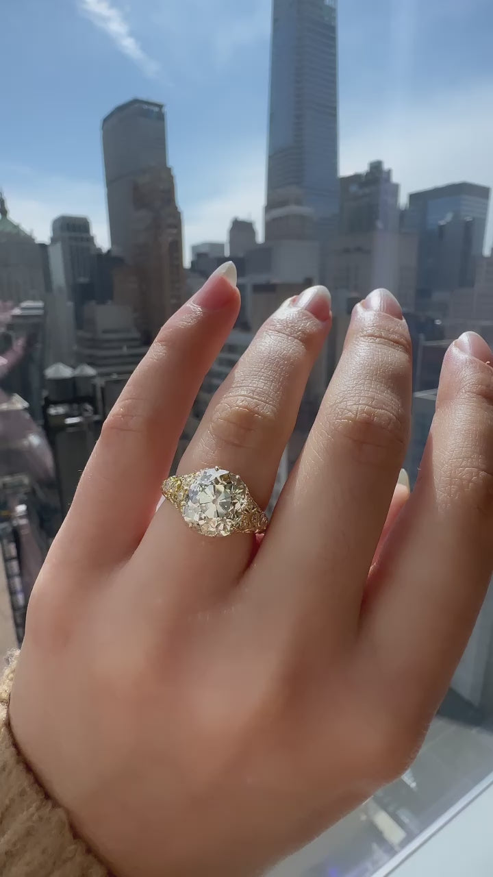 m-z color, vs clarity diamond in yellow gold setting