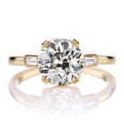 Fiery 2.15 carat Old European Cut Diamond with Chic Baguettes