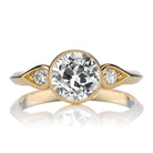 Bezel-Set Old European Cut Diamond with Dainty Accent Stones